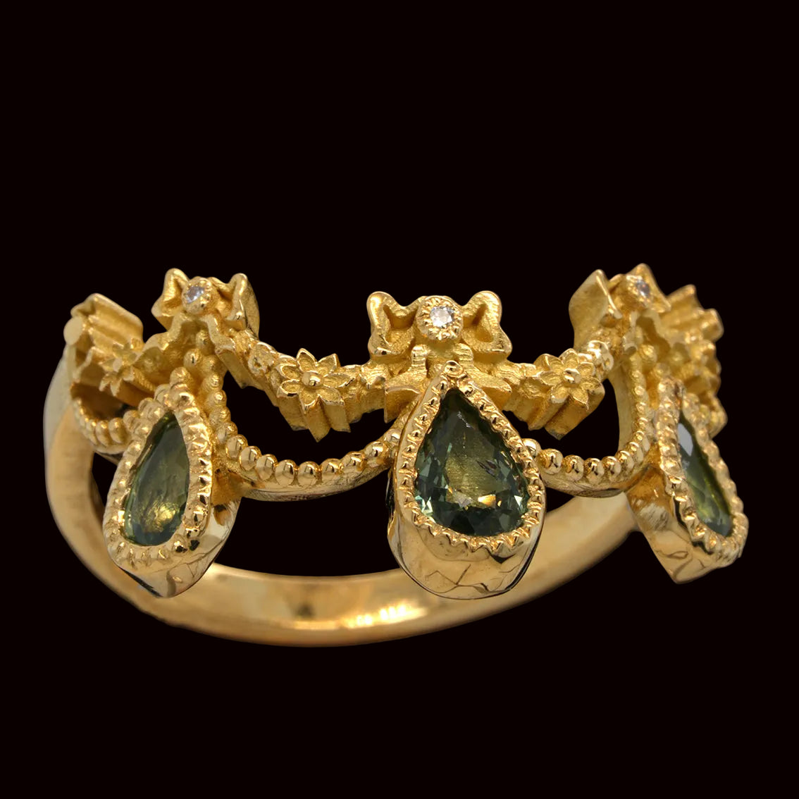 BERIBBONED GREEN SAPPHIRE RING