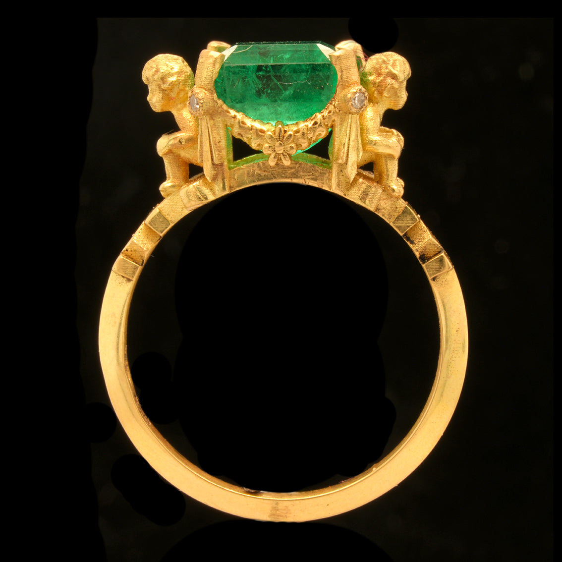 VENUS' CHERUBS AND EMERALD RING