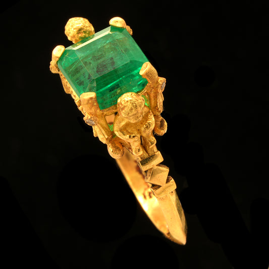 VENUS' CHERUBS AND EMERALD RING
