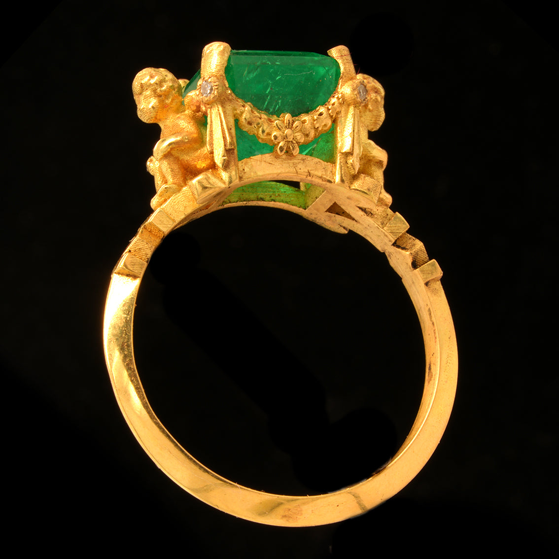 VENUS' CHERUBS AND EMERALD RING