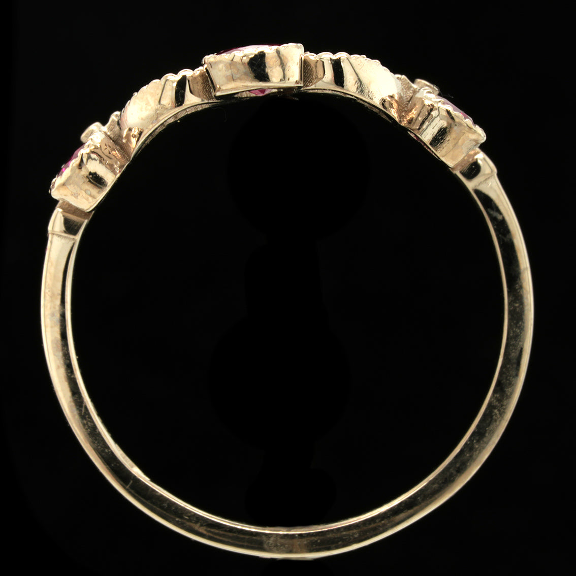 BERIBBONED RUBY RING
