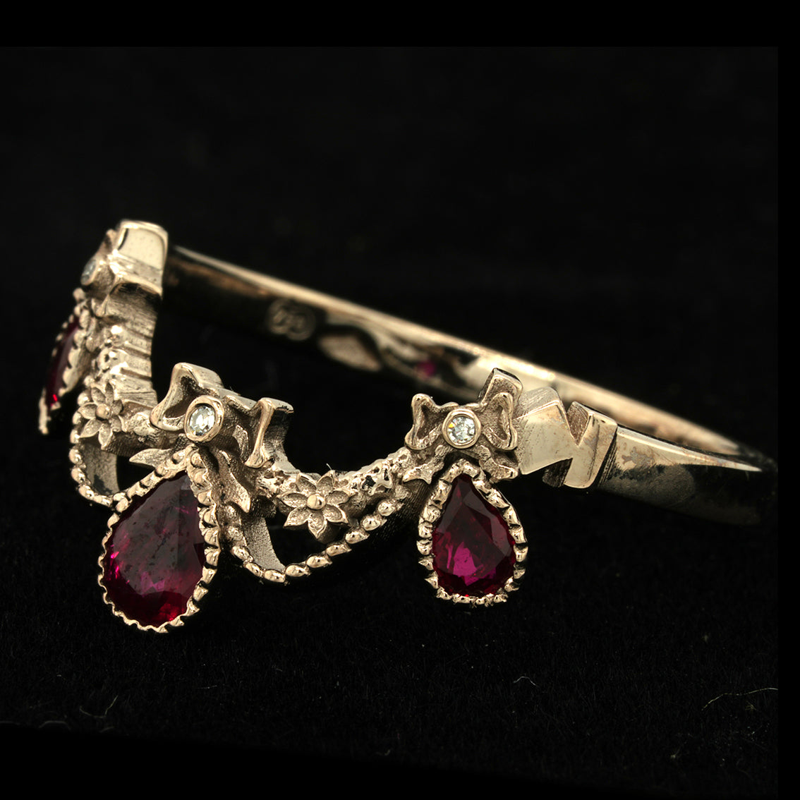 BERIBBONED RUBY RING