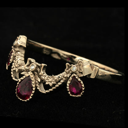 BERIBBONED RUBY RING