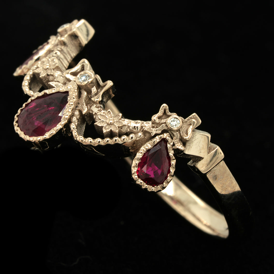 BERIBBONED RUBY RING