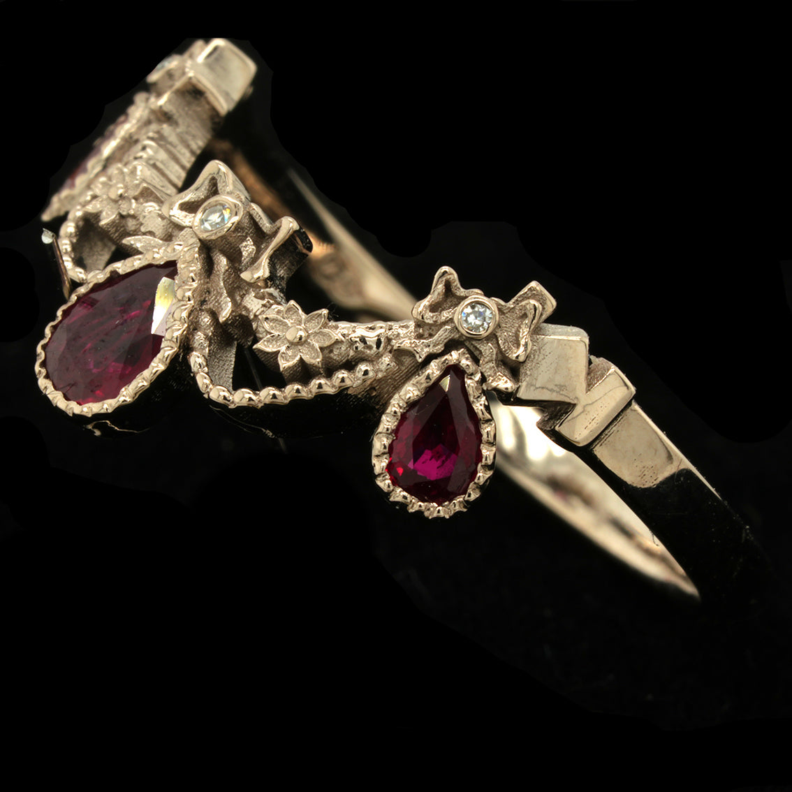 BERIBBONED RUBY RING