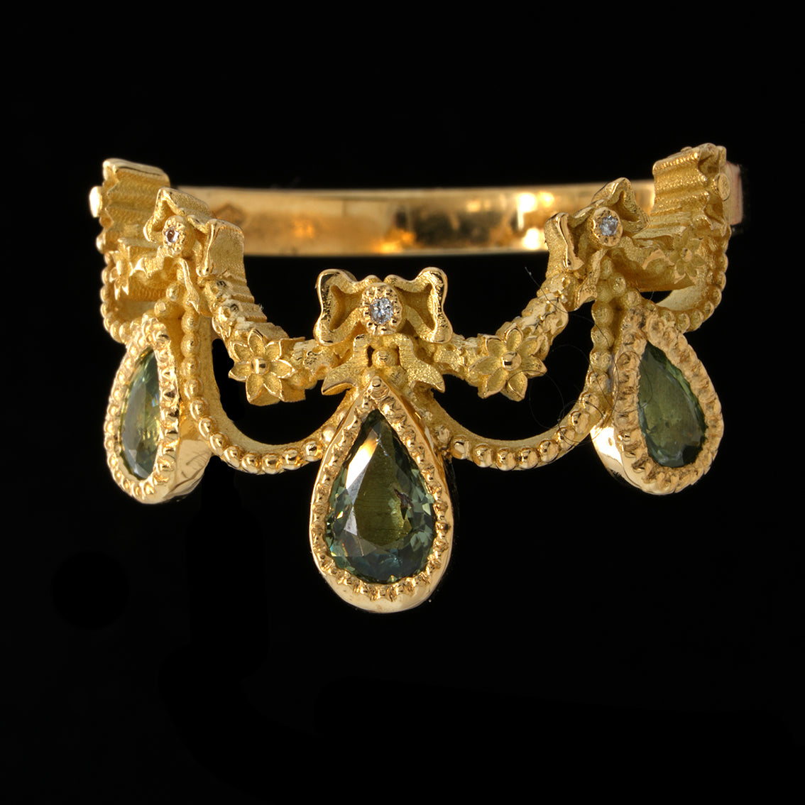 BERIBBONED GREEN SAPPHIRE RING