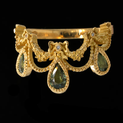 BERIBBONED GREEN SAPPHIRE RING