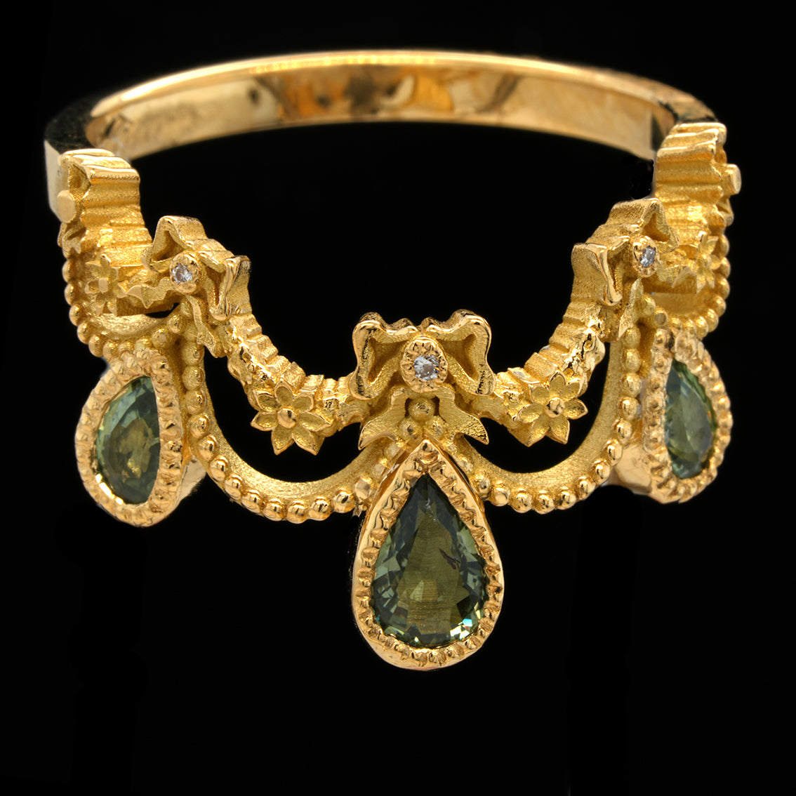 BERIBBONED GREEN SAPPHIRE RING