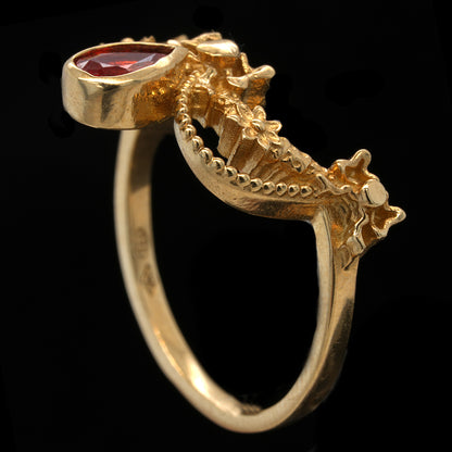 BERIBBONED ORANGE SAPPHIRE RING