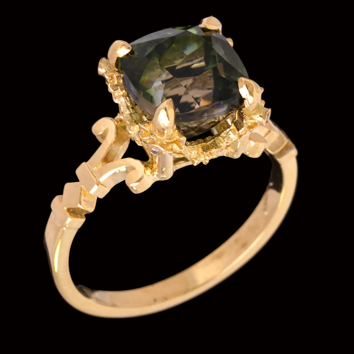 Gold ring with a green tourmaline gemstone on a black background